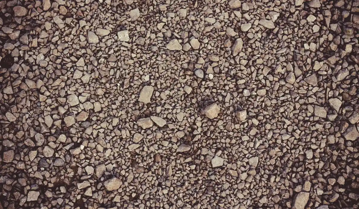 Close-up of brown gravel substrate used in an aquarium