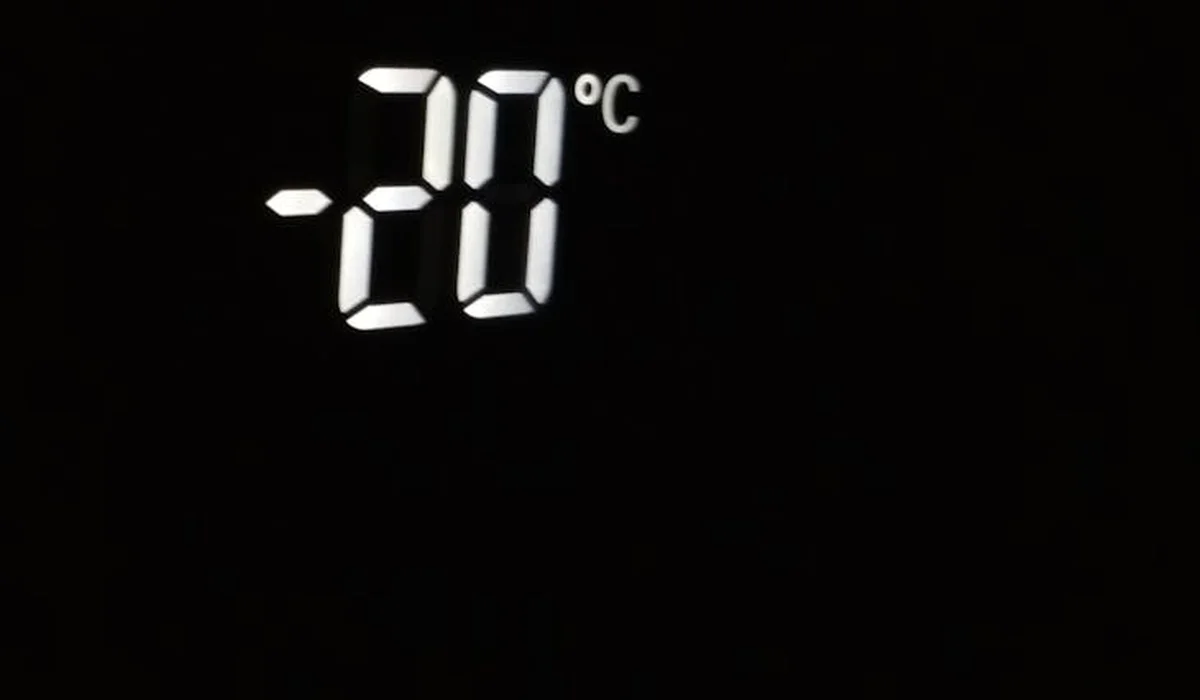 Digital thermometer display showing -20°C on a dark background
