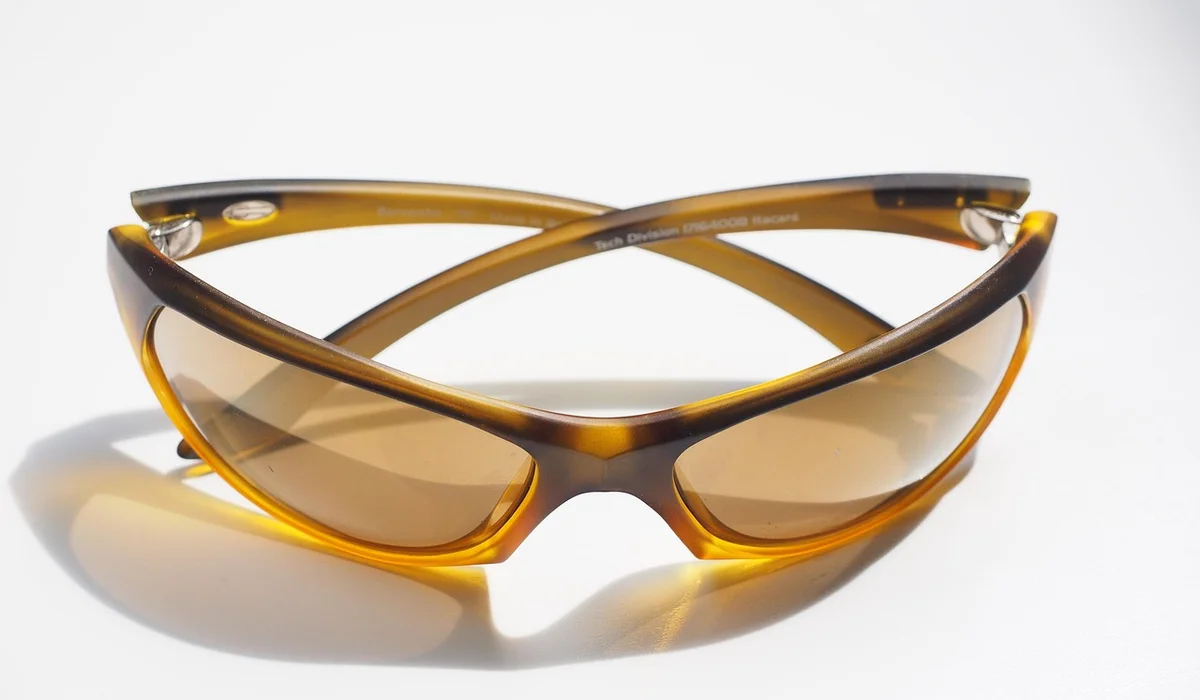 Brown wraparound sunglasses on a white background